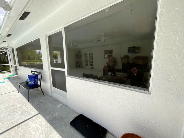 view of patio with ceiling fan