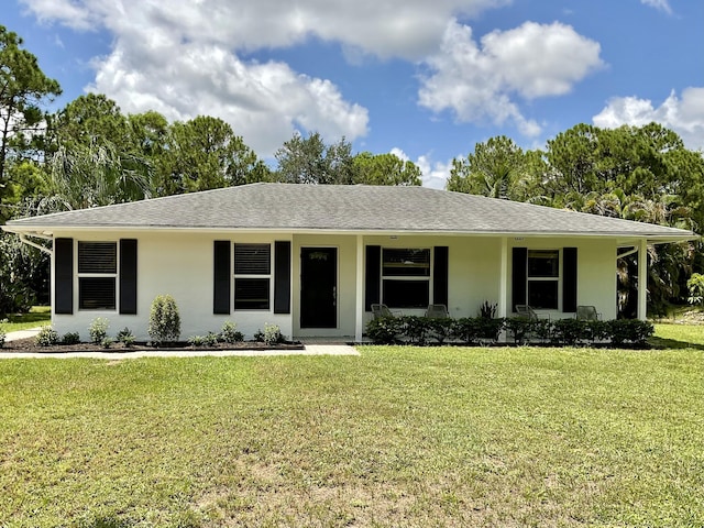 ranch-style house featuring a front yard