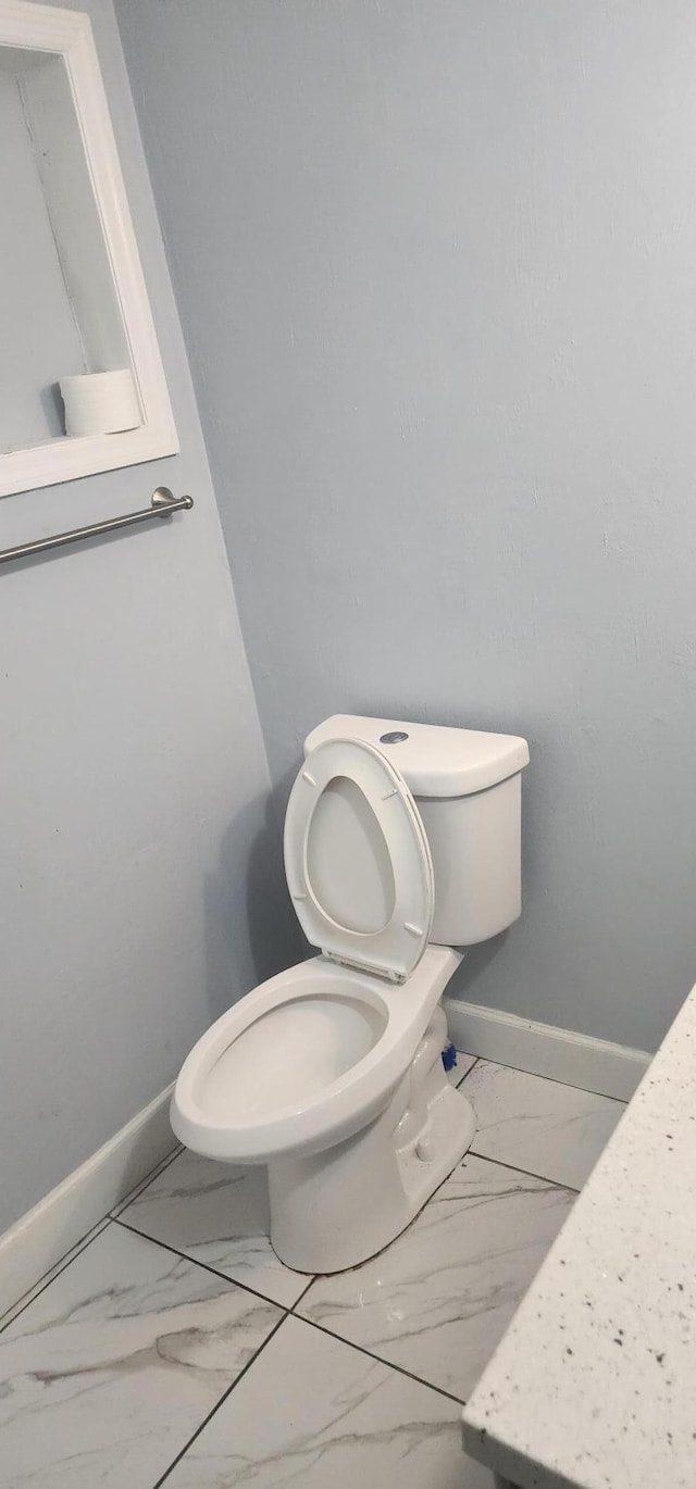 bathroom featuring toilet