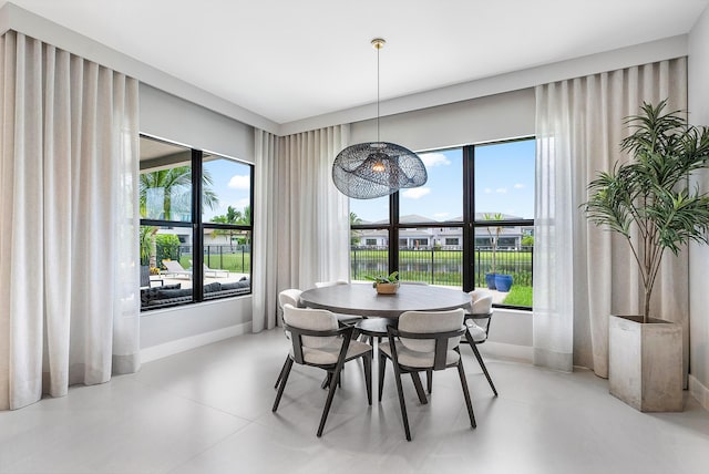 dining room featuring plenty of natural light