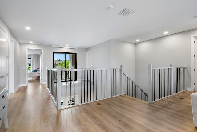 hall featuring light hardwood / wood-style flooring