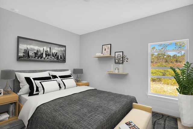 bedroom featuring hardwood / wood-style flooring