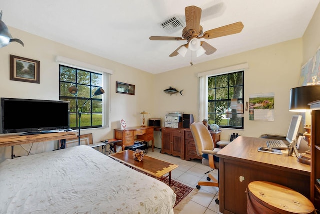 bedroom featuring light tile patterned floors and ceiling fan