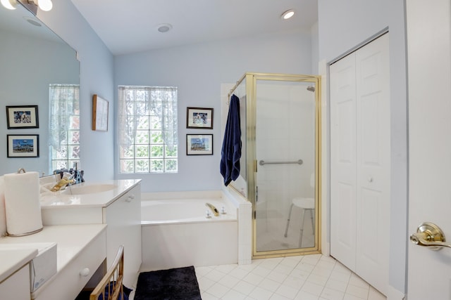 bathroom with vanity, shower with separate bathtub, vaulted ceiling, and tile patterned flooring