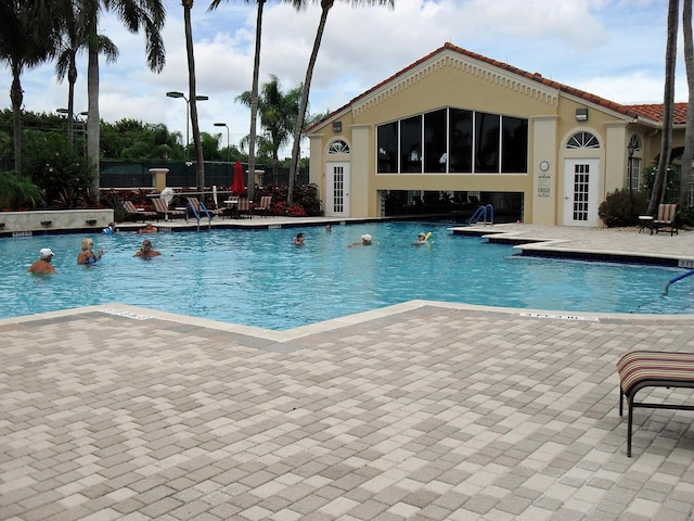 view of pool featuring a patio area