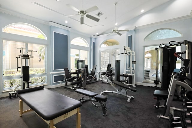 gym with high vaulted ceiling, crown molding, and ceiling fan