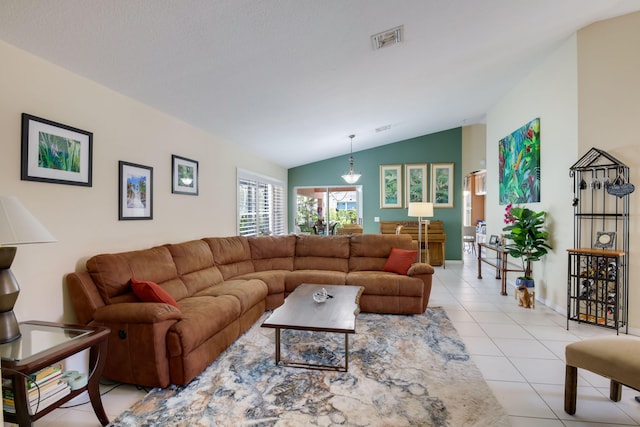 tiled living room with lofted ceiling