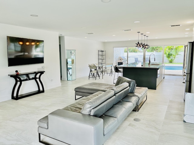 living room featuring sink