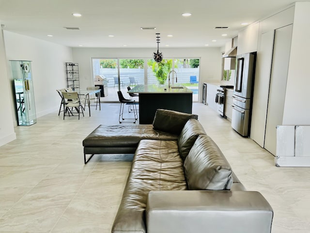 living room featuring sink