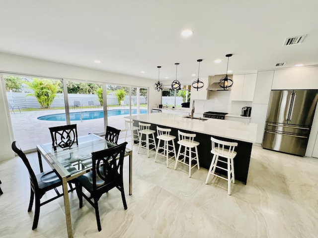 dining area featuring sink