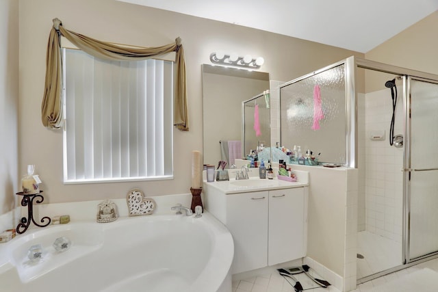 bathroom with vanity, tile patterned flooring, and independent shower and bath