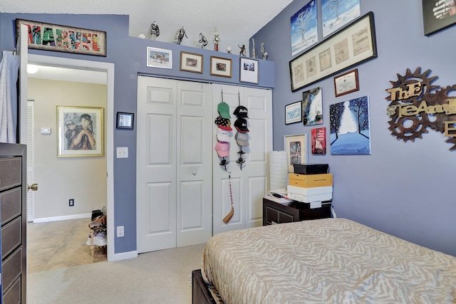 carpeted bedroom with a closet