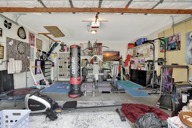 workout area featuring concrete flooring