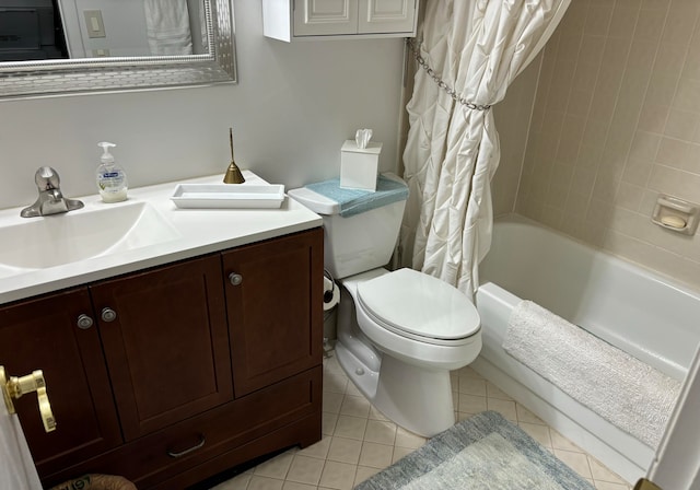 full bathroom featuring shower / tub combo with curtain, vanity, toilet, and tile patterned floors