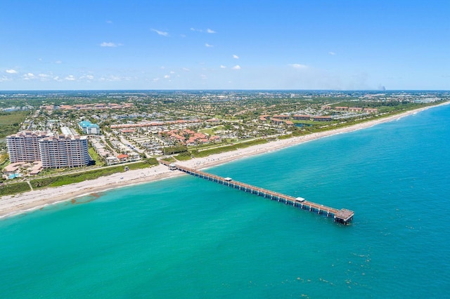 aerial view featuring a water view and a view of the beach