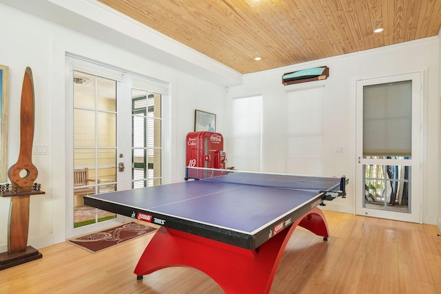 playroom with french doors, wooden ceiling, and light wood-style floors