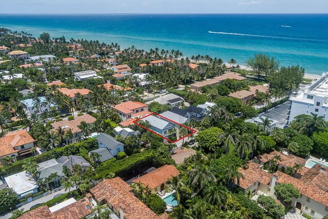 drone / aerial view featuring a residential view and a water view