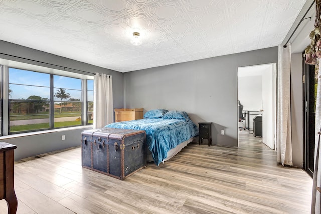 bedroom featuring hardwood / wood-style flooring