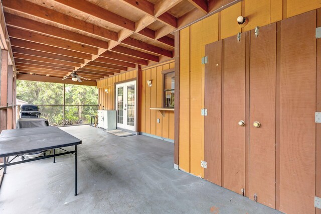 view of patio / terrace featuring ceiling fan and french doors