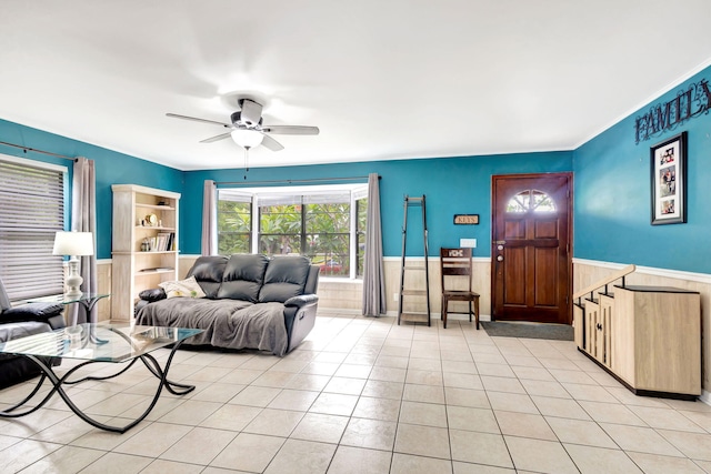 tiled living room featuring ceiling fan