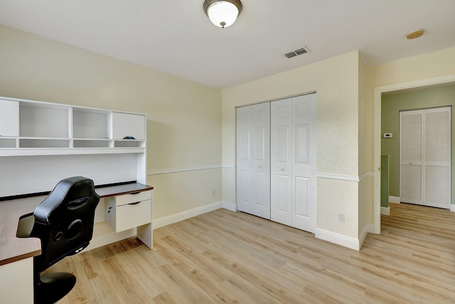 office space featuring light hardwood / wood-style floors