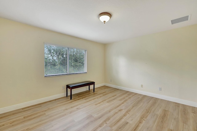 unfurnished room featuring light hardwood / wood-style flooring