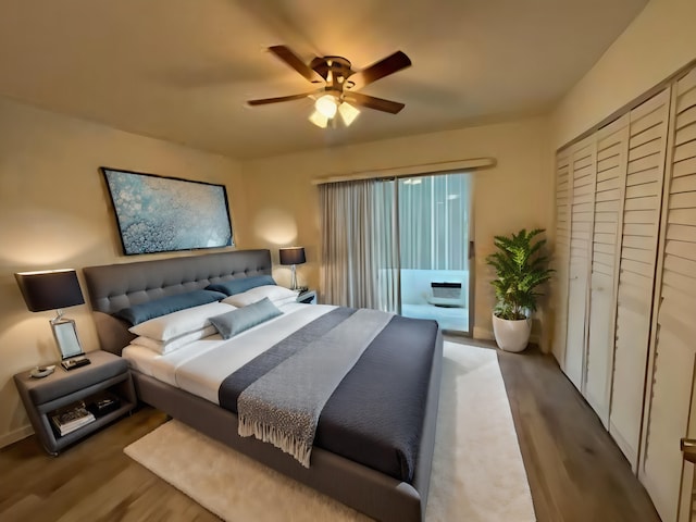 bedroom featuring wood-type flooring and ceiling fan