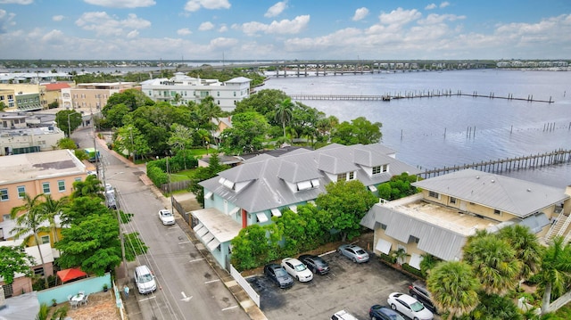 birds eye view of property with a water view