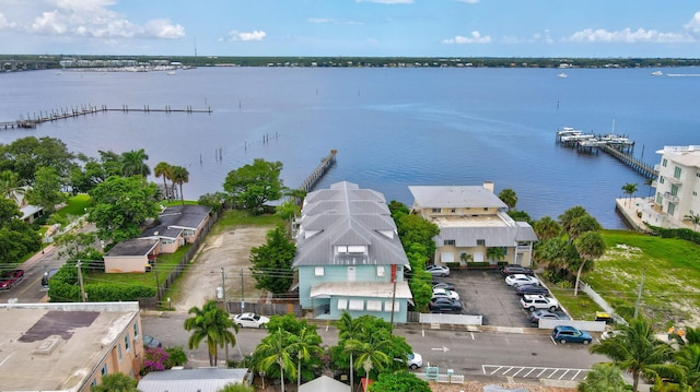 birds eye view of property featuring a water view