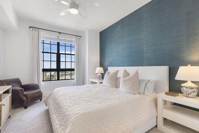 carpeted bedroom featuring ceiling fan