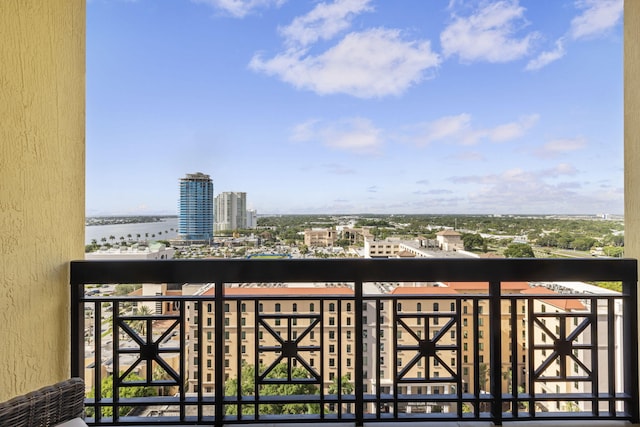 balcony featuring a water view