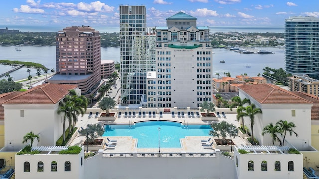 exterior space featuring a patio and a water view