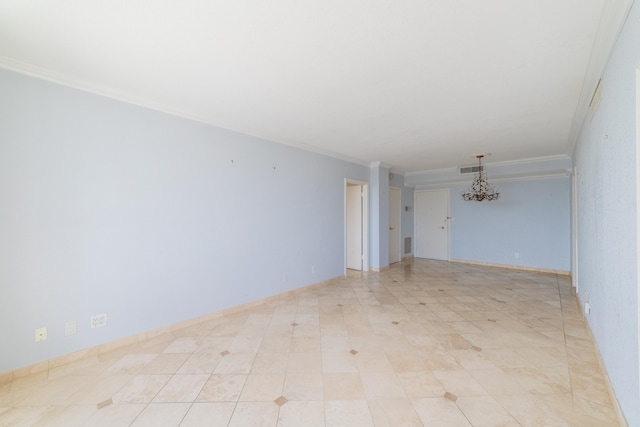 unfurnished room featuring a notable chandelier and ornamental molding