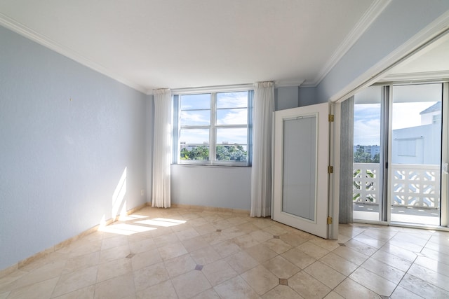 empty room featuring ornamental molding and light tile patterned floors