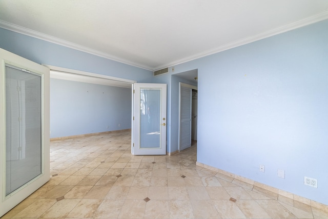 unfurnished room with ornamental molding