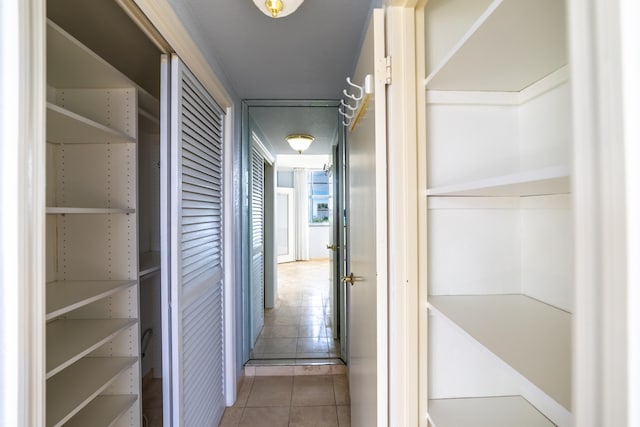 corridor with tile patterned floors