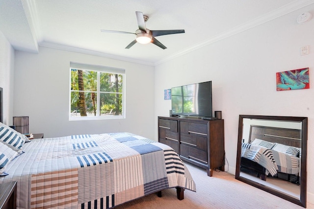 bedroom featuring carpet flooring, crown molding, and ceiling fan