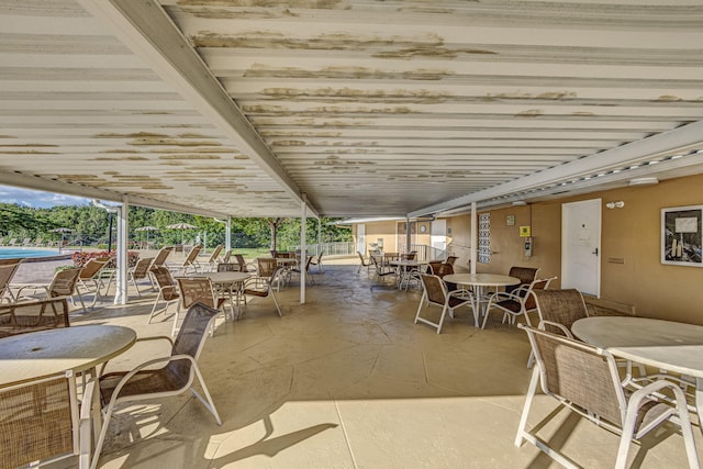 view of patio / terrace featuring a swimming pool