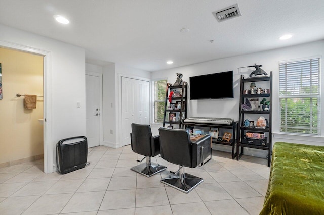 home office featuring light tile patterned floors