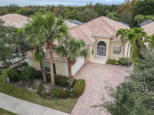 mediterranean / spanish-style home featuring french doors