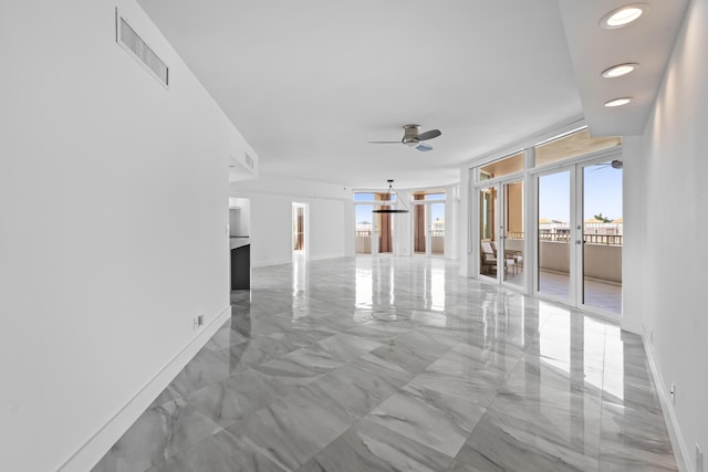 300 SE 5th Ave Unit 5180, Boca Raton, FL 33432 - spare room with a ceiling fan, light marble finish flooring, baseboards, and recessed lighting