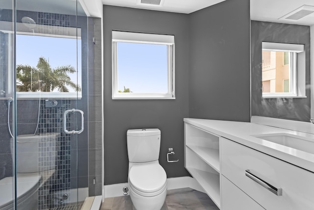300 SE 5th Ave Unit 5180, Boca Raton, FL 33432 - bathroom featuring vanity, plenty of natural light, toilet, and marble finish floors