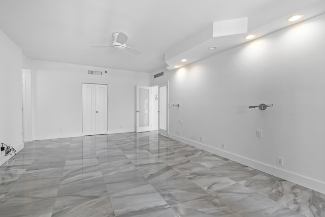 300 SE 5th Ave Unit 5180, Boca Raton, FL 33432 - spare room featuring recessed lighting, light marble finish flooring, a ceiling fan, and baseboards