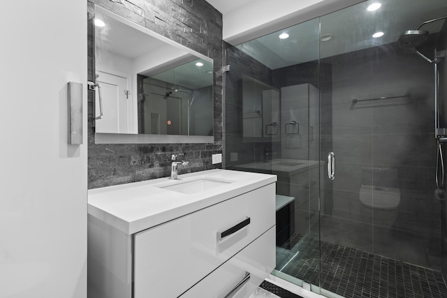300 SE 5th Ave Unit 5180, Boca Raton, FL 33432 - bathroom with vanity, a stall shower, tasteful backsplash, and recessed lighting