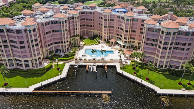 birds eye view of property featuring a water view