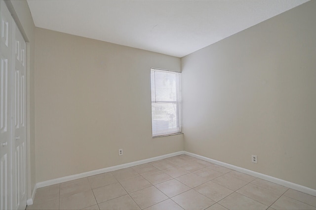 view of tiled spare room