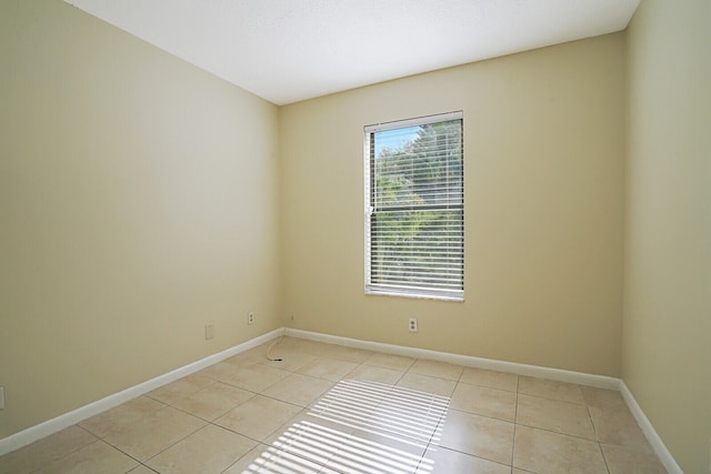 view of tiled spare room