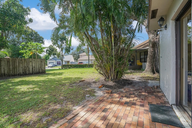 view of yard with a patio area