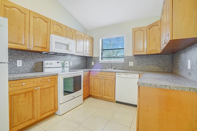 kitchen featuring lofted ceiling, sink, white appliances, and backsplash