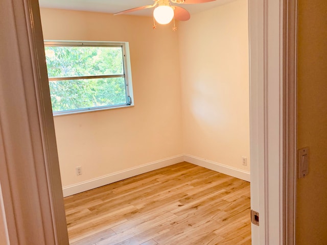 unfurnished room with light hardwood / wood-style flooring and ceiling fan